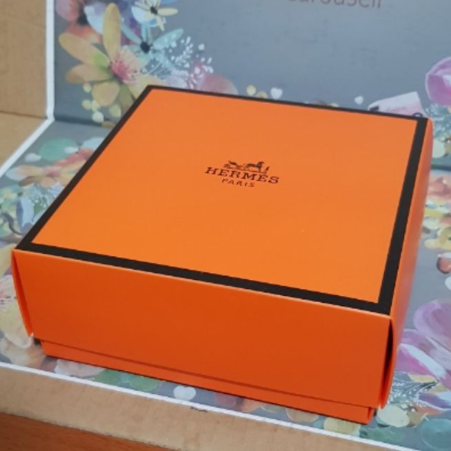 Hermes and Dior Boxes Pls READ (Category: Storage Boxes & Baskets) located in Paranaque City. Submitted by vintagepopsicle (Listing ID 1285396588, Image 1). Description: Hermes and Dior Box for Bags or Wallets Size is 6 x 6 x 2.5 inches NO IDEA if orig or not. It's a box. Put it in your wardrobe and instagram as a background element for your flex, no one will know. Sold as a SET. Sold as it is. Examine actual photos here pls. Gcash and Lalamove.