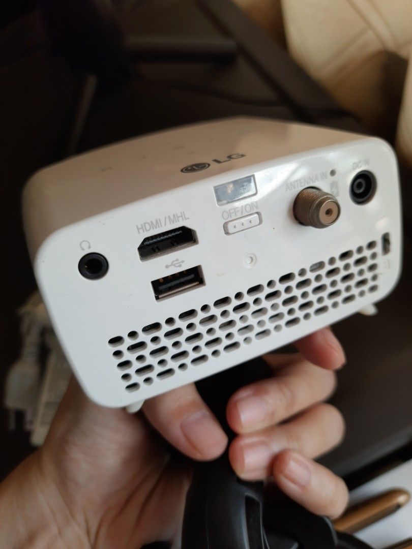 LG Minibeam Projector PH300 (RUSH) (Category: Projectors) located in Quezon City. Submitted by joyluckcloset (Listing ID 1285370486, Image 2). Description: Includes: - Original Box - Original Remote - Original Adaptor - LG Projector - Only seldomly used by my toddler to watch shows I saved in her USB drive. 💯 No defects. Bought: P24,500.00 Selling: P4,999 only (RUSH Super repriced na) RFS: Not being used already. Padala from kamag-anak sa States