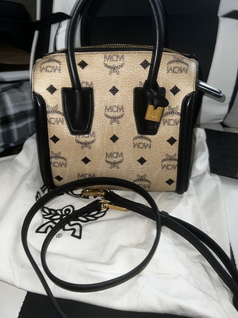 MCM BOSTON BAG MINI VISETOS BAG AUTHENTIC (Category: Luxury Bags & Wallets) located in Mandaluyong City. Submitted by leajiwon (Listing ID 1285364175, Image 1). Description: Seldom used. mcm visetos top handle mini satche. Includes protection bag and mini envelope for care cards & leaflets Cream color Only missing is the serial number card. Cant find it na You can check it @Twin oaks place shaw blvd .