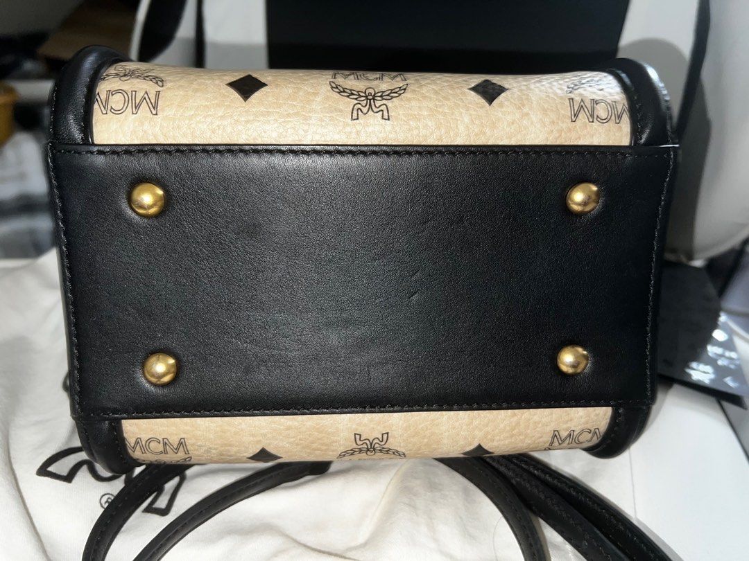 MCM BOSTON BAG MINI VISETOS BAG AUTHENTIC (Category: Luxury Bags & Wallets) located in Mandaluyong City. Submitted by leajiwon (Listing ID 1285364175, Image 3). Description: Seldom used. mcm visetos top handle mini satche. Includes protection bag and mini envelope for care cards & leaflets Cream color Only missing is the serial number card. Cant find it na You can check it @Twin oaks place shaw blvd .