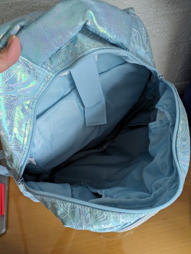 Smiggle frozen elsa Backpack Disney princess Elsa backpack school bag girls school bag haversack bag light blue sparkle bag (Category: Backpacks) located in Singapore. Submitted by designtots (Listing ID 1285411644, Image 2). Description: Smiggle frozen elsa Backpack Disney princess Elsa backpack school bag girls school bag haversack bag light blue sparkle bag condition as shown in photo not for fussy.