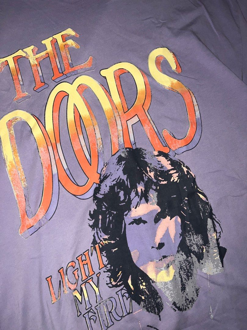 The Doors H&M Tee (Category: Shirts) located in Manila. Submitted by florescant (Listing ID 1285532301, Image 2). Description: - size xs on tag. W: 20 L: 28 - used twice only. still in good condition - all actual photos are already posted.