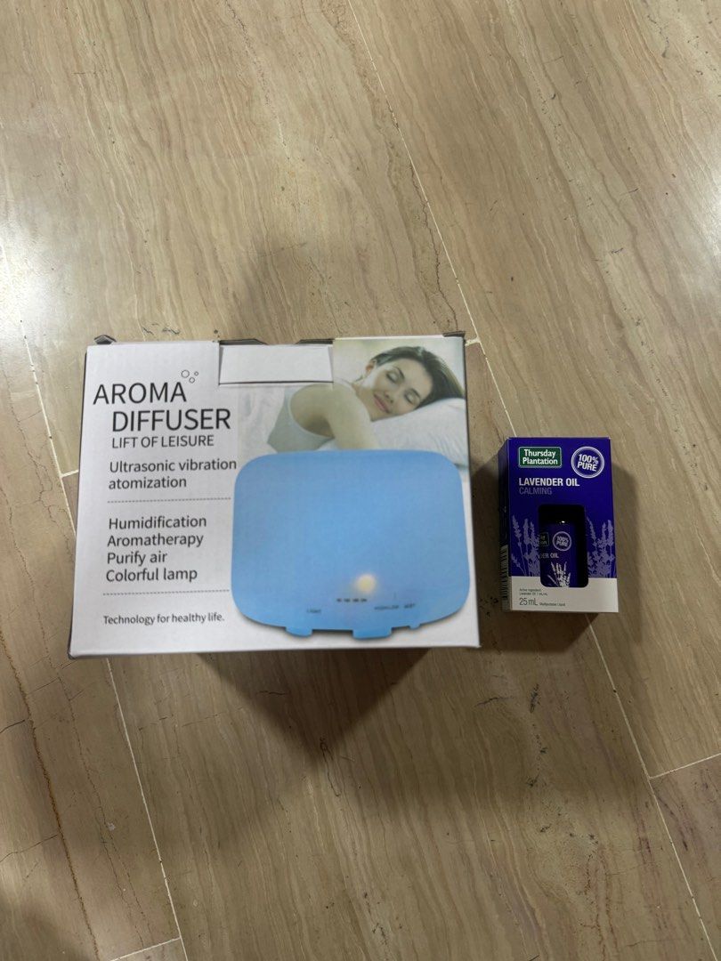 aroma diffuser (Category: Home Fragrance) located in Singapore. Submitted by laladeedoo (Listing ID 1285583378, Image 1). Description: received as gift but already have 1 at home. selling off with essential oil. fast deal @$20.