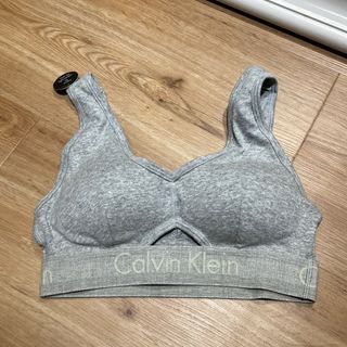 Buy Calvin Klein Logo Waistband Medium Support Sports Bra In Grey
