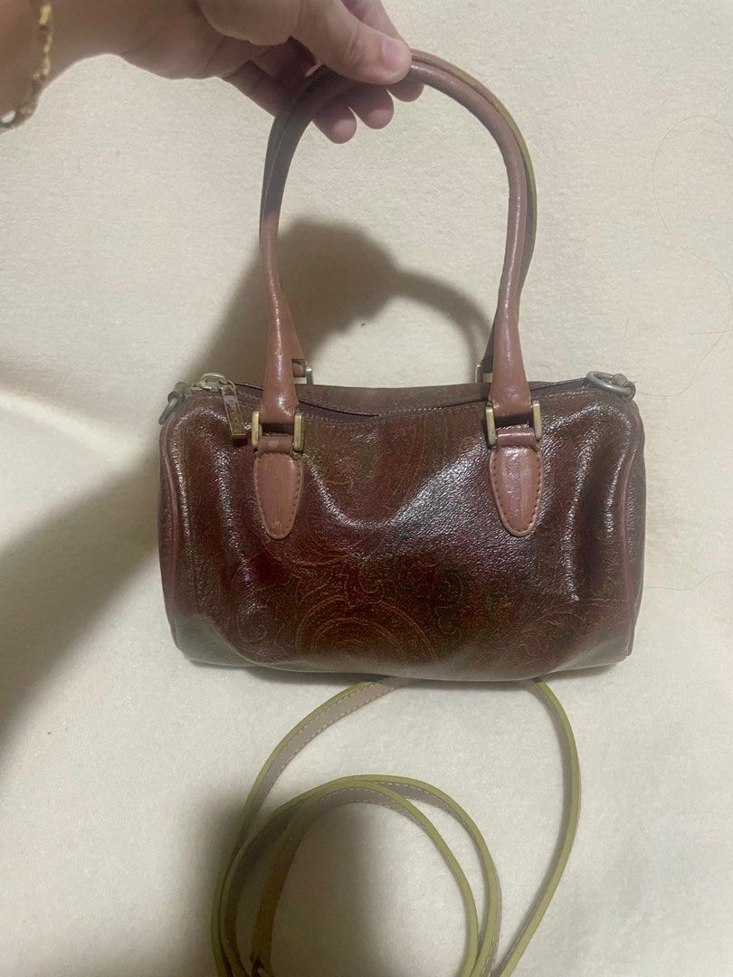 ETRO small papillon 2-way bag (Category: Luxury Bags & Wallets) located in San Pablo. Submitted by prelovedbymistyblue (Listing ID 1285698969, Image 2). Description: Authentic Etro small papillon bag. Can be used as handbag and shoulder bag. With fading on hardware, rubs on one side of the piping. The handle is repainted and not in perfect form. Measure 8 x 4.5 x 4 inches. Selling low for 1100. .