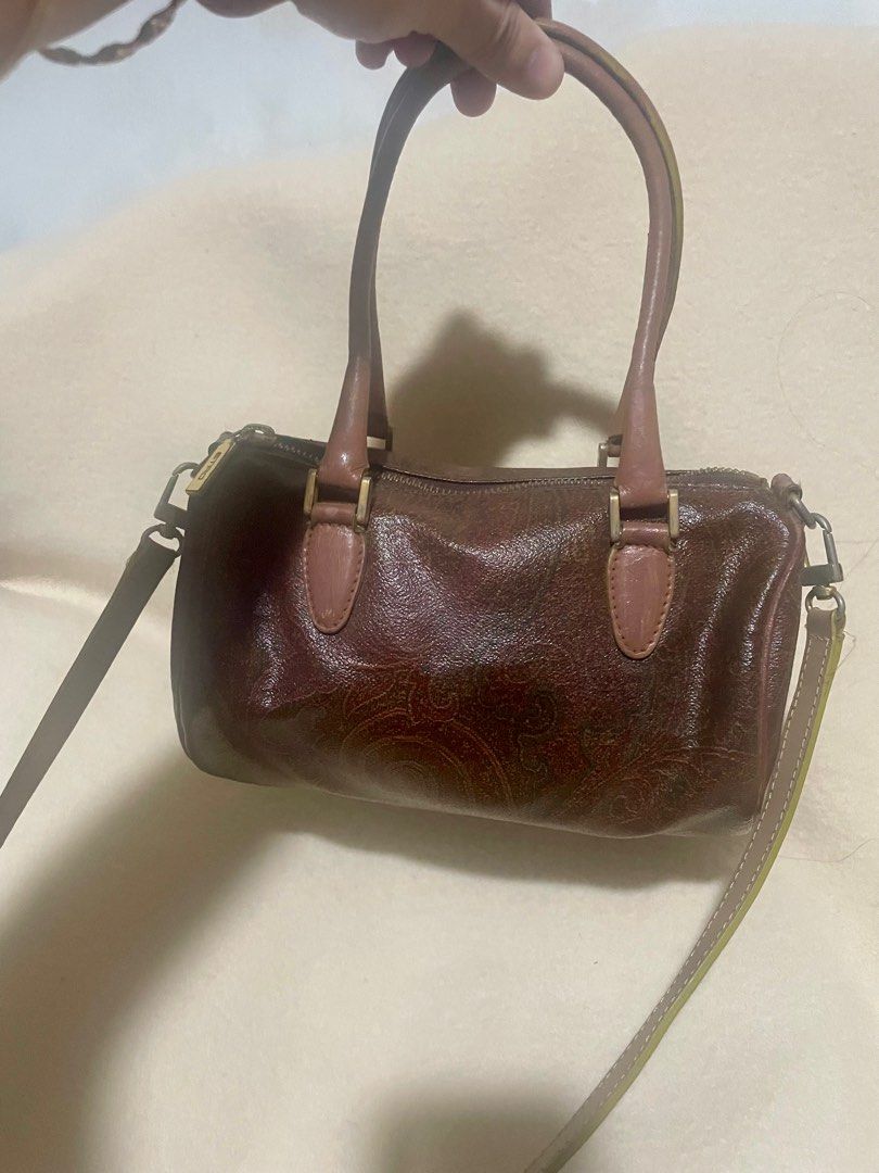 ETRO small papillon 2-way bag (Category: Luxury Bags & Wallets) located in San Pablo. Submitted by prelovedbymistyblue (Listing ID 1285698969, Image 1). Description: Authentic Etro small papillon bag. Can be used as handbag and shoulder bag. With fading on hardware, rubs on one side of the piping. The handle is repainted and not in perfect form. Measure 8 x 4.5 x 4 inches. Selling low for 1100. .