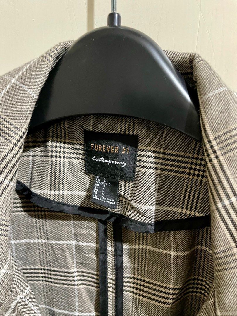 Forever 21 Brown Plaid Light Trenchcoat (Category: Coats, Jackets and Outerwear) located in Makati City. Submitted by mpr3rd (Listing ID 1285658910, Image 3). Description: Used once and kept. Chest - 26” Shoulder - 25.5” Length - 38”.
