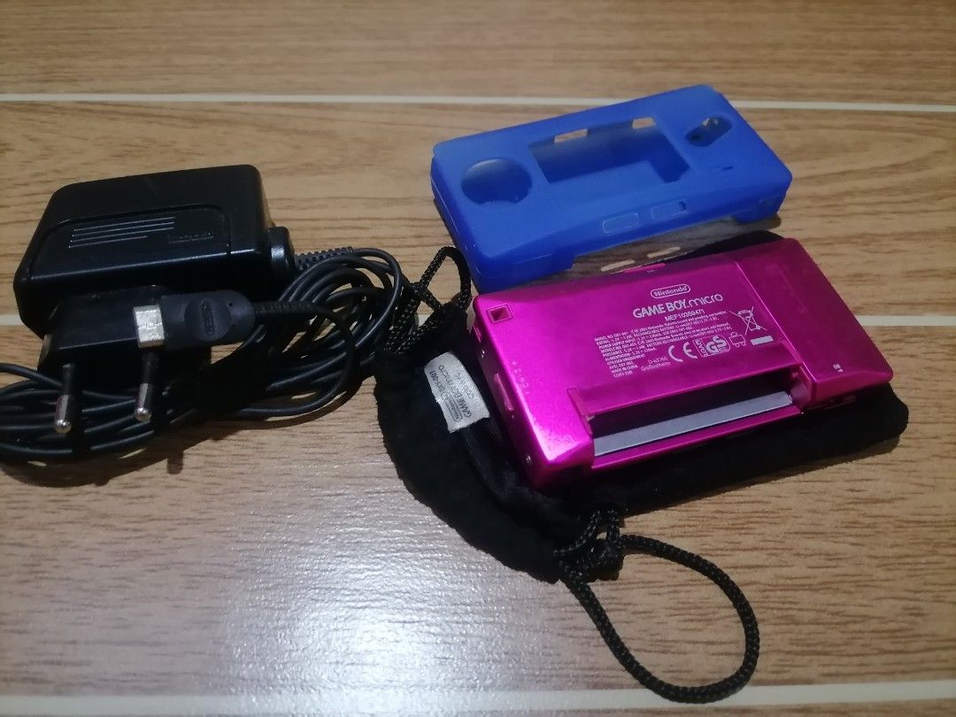 Gameboy micro with original charger,pouch and silicon (Category: Nintendo) located in Cainta. Submitted by apolloeleven33 (Listing ID 1285690259, Image 2). Description: Gameboy micro with original charger,pouch and silicon Makinis(see picture) Goods all buton Sounds malakas Light good Note: (hindi po ito ginamit pang game kaya makinis at hindi laspag) Price 10,000.
