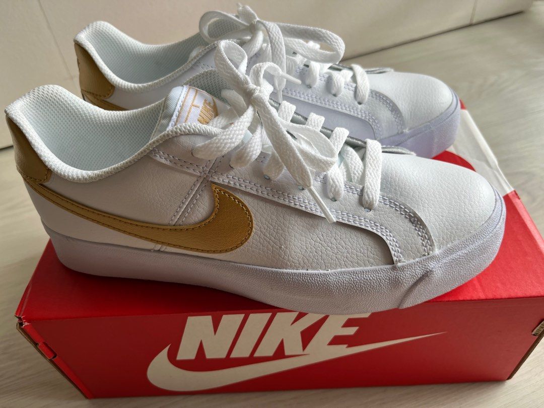 Nike White and Gold Sneakers