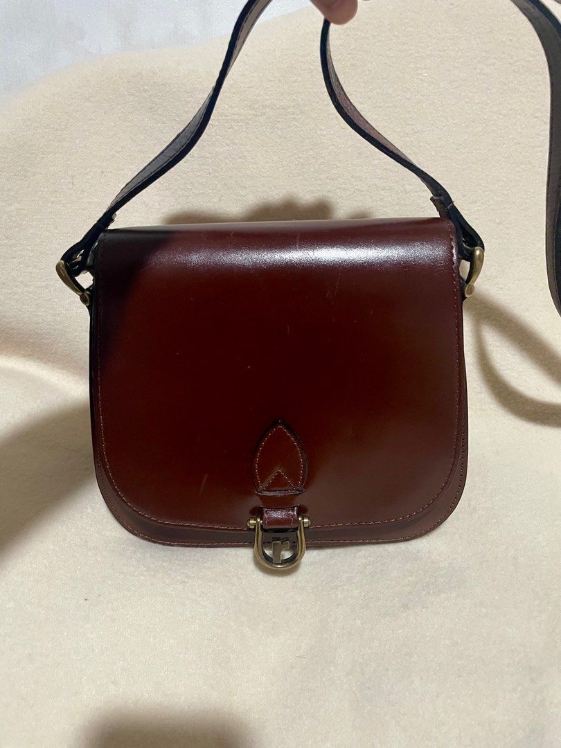 RENOMA shoulder bag SUPER SALE (Category: Luxury Bags & Wallets) located in San Pablo. Submitted by prelovedbymistyblue (Listing ID 1285701280, Image 1). Description: Super nice Renoma shoulder bag/sling bag. No major flaws except minimal scratches. Hardwares still very nice. Measures 8.2 x 7.5 x 2.2 inches. Selling low for 1750, then 1650, then 1450, down to 700. .