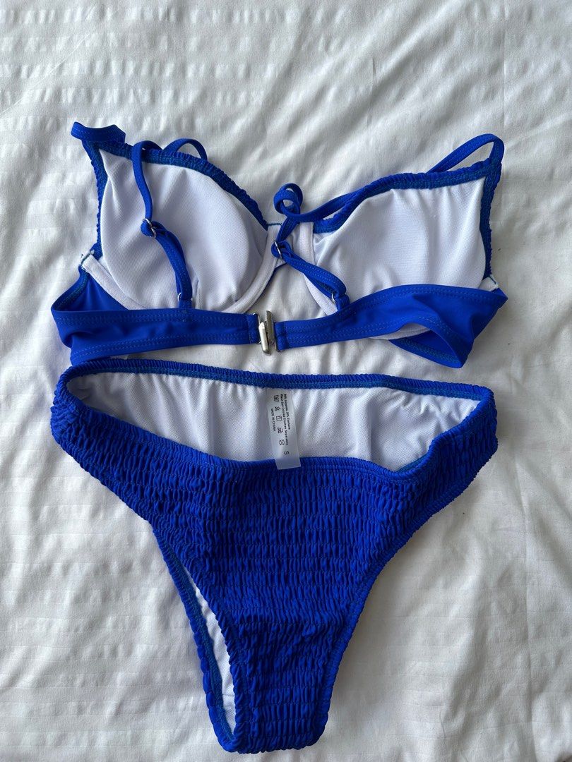 Shein Swim Basics (Category: Bikinis & Swimsuits) located in Pasig City. Submitted by secondbase_ (Listing ID 1285652106, Image 3). Description: SHEIN Swim Basics Smocked Underwire Bikini Swimsuit Color: Royal Blue Size: Small Never been used, fitted only once! Very good quality, comfy, bottoms are not too cheeky :) Complete w ziplock & hygienic liner RFS: Double order 🥲.