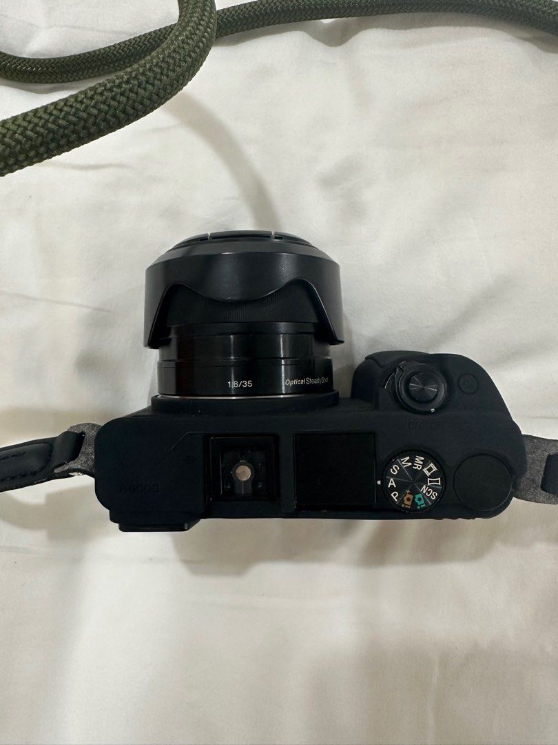 Sony Alpha A6000 complete with box, manuals, kit lens (Category: Cameras) located in Quezon City. Submitted by my.arte (Listing ID 1285686077, Image 3). Description: Selling my barely used Sony Alpha A6000, in EXCELLENT condition. Complete package -with box, manuals, charger, and camera bag -with kit lens (SELP1650) -originally priced at 35K in Henrys Add E-Mount Prime Lens E 35 mm F1.8 OSS (SEL35F18) for +20K (originally priced at 24K) Can test 