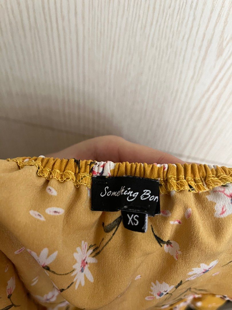 Yellow floral off shoulder top (Category: Blouses) located in Manila. Submitted by kimtaeri21 (Listing ID 1285594662, Image 3). Description: Brand: Something Borrowed from Zalora You can get a discount if you buy multiple items!.