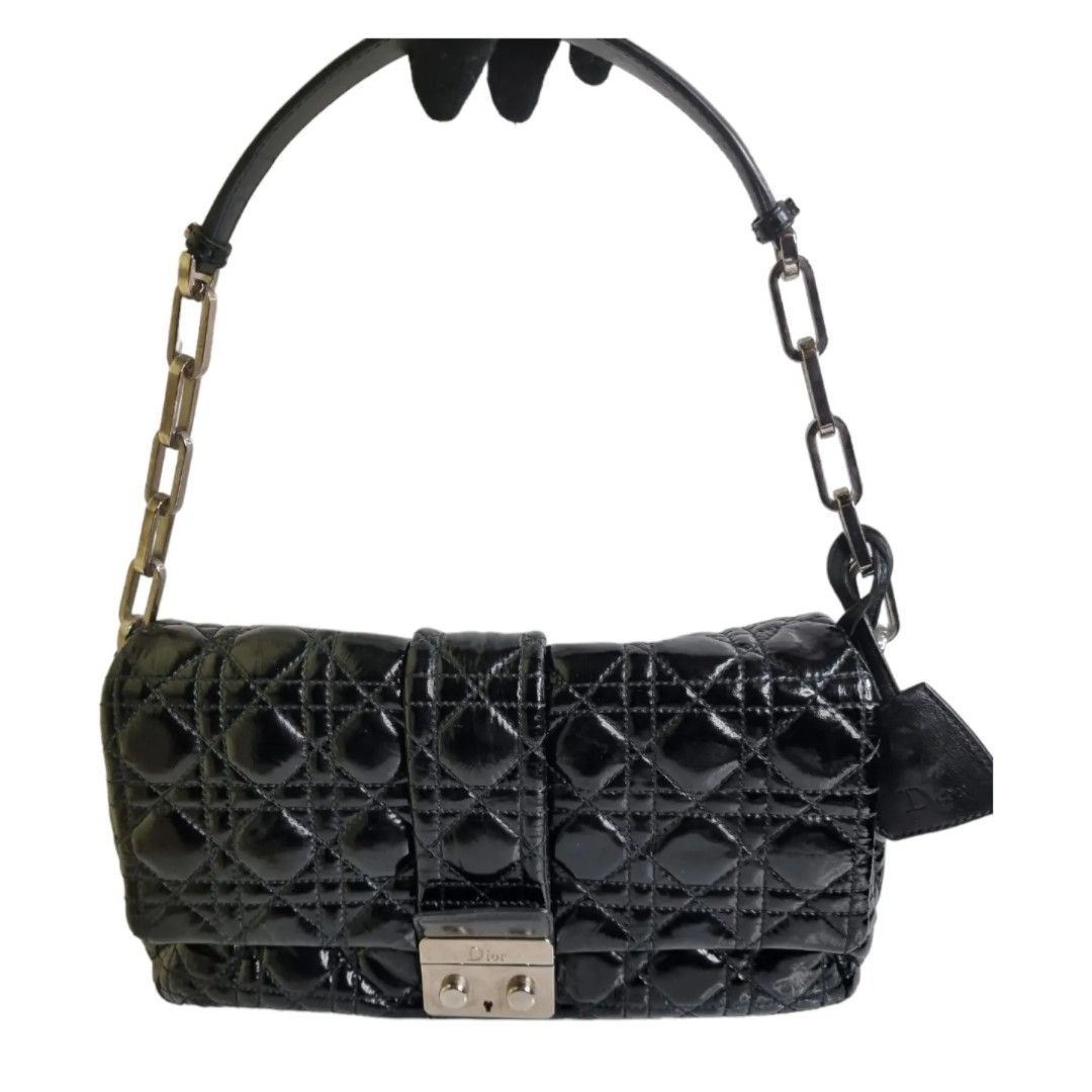 Authentic CHRISTIAN DIOR CanNage New Lock (Category: Luxury Bags & Wallets) located in Quezon City. Submitted by manerarestorationservices (Listing ID 1290510919, Image 1). Description: SALE SALE SALE❗❗❗ Price is still negotiable Money back Guarantee 💯% Guaranteed authentic *Brand: CD Cannage flap new lock *Materials: patent *Color: black *Size: small - medium *Condition: 8/10 -Used * Inclusions: bag only All items from our shop are lifetime 30%