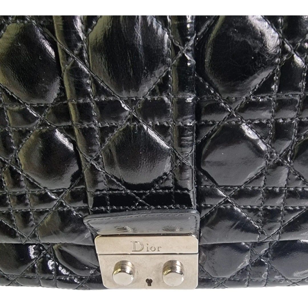 Authentic CHRISTIAN DIOR CanNage New Lock (Category: Luxury Bags & Wallets) located in Quezon City. Submitted by manerarestorationservices (Listing ID 1290510919, Image 2). Description: SALE SALE SALE❗❗❗ Price is still negotiable Money back Guarantee 💯% Guaranteed authentic *Brand: CD Cannage flap new lock *Materials: patent *Color: black *Size: small - medium *Condition: 8/10 -Used * Inclusions: bag only All items from our shop are lifetime 30%