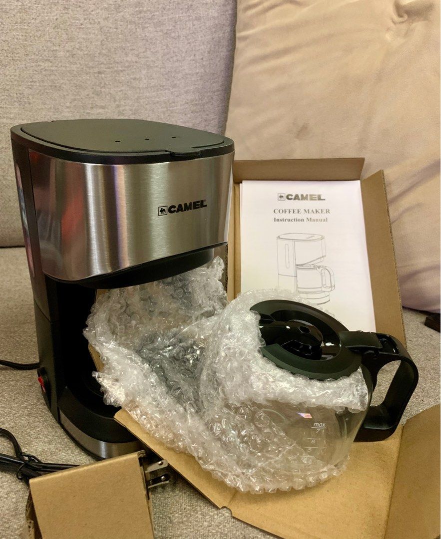 Camel Coffee Drip Maker (Category: Coffee Machines & Makers) located in Mandaluyong City. Submitted by akosi_menggay (Listing ID 1290579911, Image 2). Description: -Capacity: 0.6L (4-6 cups) -Power: 550W -With washable filter and filter holder -With warming plate for keeping coffee warm and fresh for hours -With power light indicator -With water level gauge -Includes permanent filter and spoon -With anti-drip device .