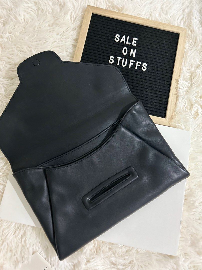 Givenchy Antigona Envelope Clutch (Category: Luxury Bags & Wallets) located in Baguio. Submitted by saleonstuffs (Listing ID 1290476256, Image 2). Description: Comes with box and card Very Good Condition Classy and clean.