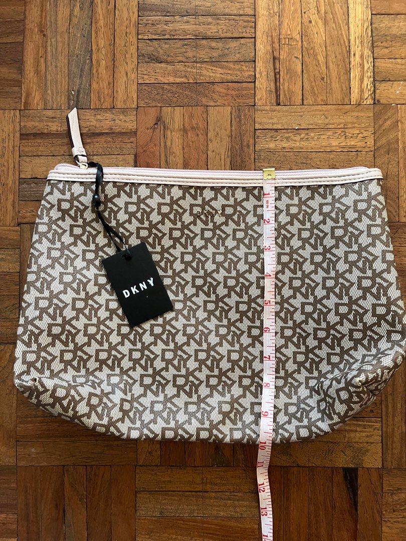 FREE Original DKNY Envelope Bag (Category: Purses & Pouches) located in Makati City. Submitted by yoursecondbest (Listing ID 1290462935, Image 3). Description: For 1k above order. Flaws are declared in the photos. Never used this. Prettier in actual..