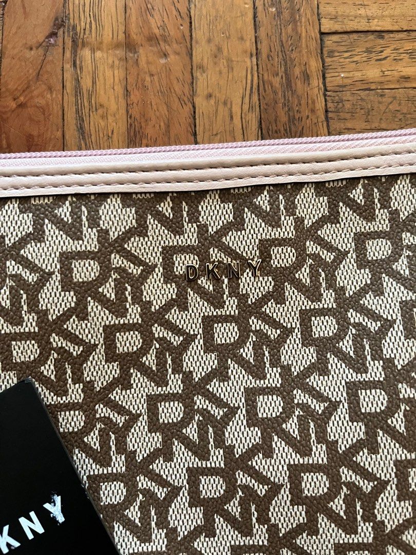 FREE Original DKNY Envelope Bag (Category: Purses & Pouches) located in Makati City. Submitted by yoursecondbest (Listing ID 1290462935, Image 2). Description: For 1k above order. Flaws are declared in the photos. Never used this. Prettier in actual..