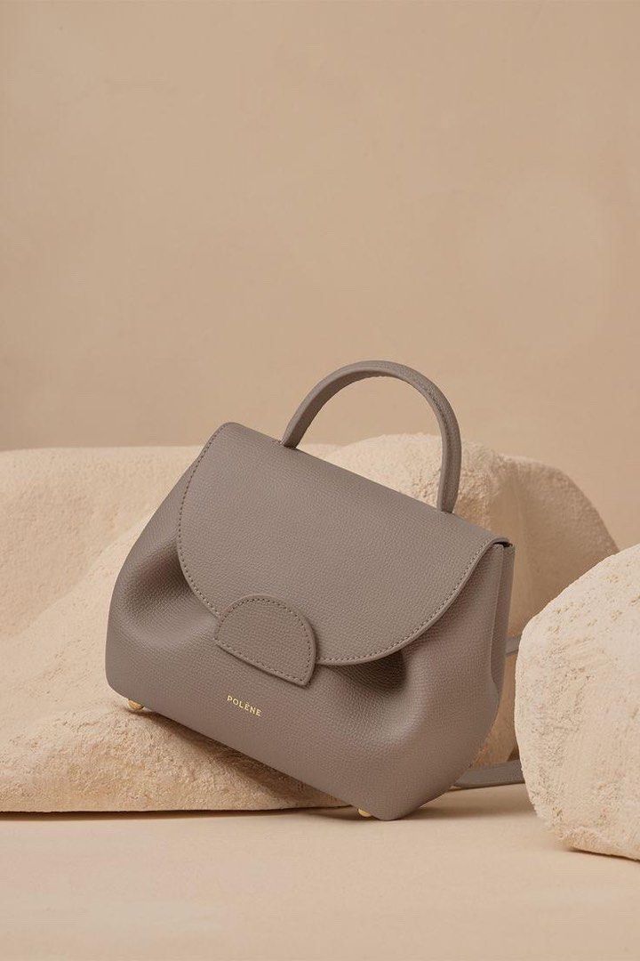💯ORIGINAL POLENE NUMERO UN NANO TEXTURED TAUPE (Category: Luxury Bags & Wallets) located in Quezon City. Submitted by ashongsstore (Listing ID 1290491790, Image 2). Description: 🇵🇭AVAILABLE🇵🇭 Numéro Un Nano EDITION TEXTURED TAUPE A reinterpretation of Polène’s flagship model, the “Numéro Un Nano” is instantly recognizable thanks to the blended curves and folds that give this model its signature shape. Dimensions: 20.5 X 17 X 9 cm. Weight: 44