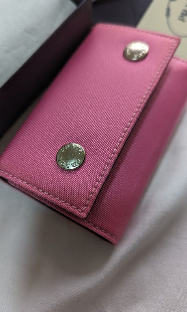 Prada Keycase Authentic 💯 (Category: Luxury Bags & Wallets) located in Quezon City. Submitted by kkk.gubat (Listing ID 1290510193, Image 2). Description: complete with box and authenticity card unused no flaws 6 key rings.