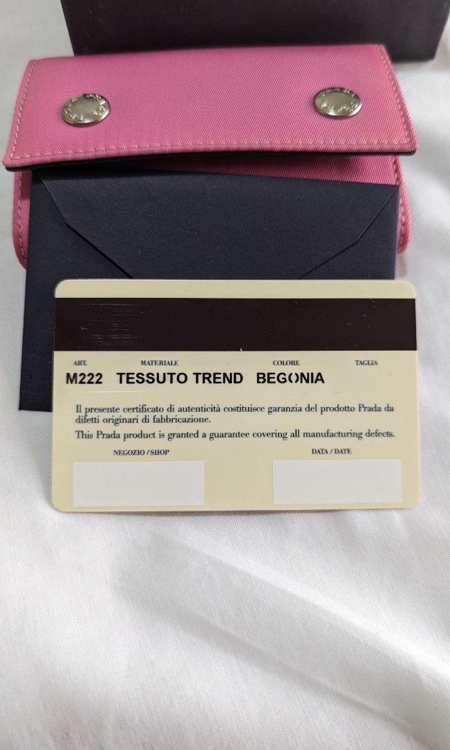 Prada Keycase Authentic 💯 (Category: Luxury Bags & Wallets) located in Quezon City. Submitted by kkk.gubat (Listing ID 1290510193, Image 3). Description: complete with box and authenticity card unused no flaws 6 key rings.
