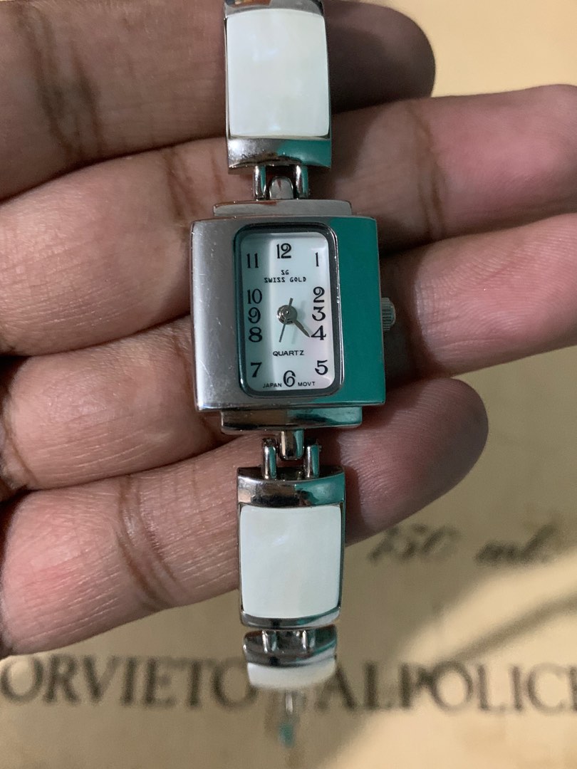 Sg swiss gold watch deals