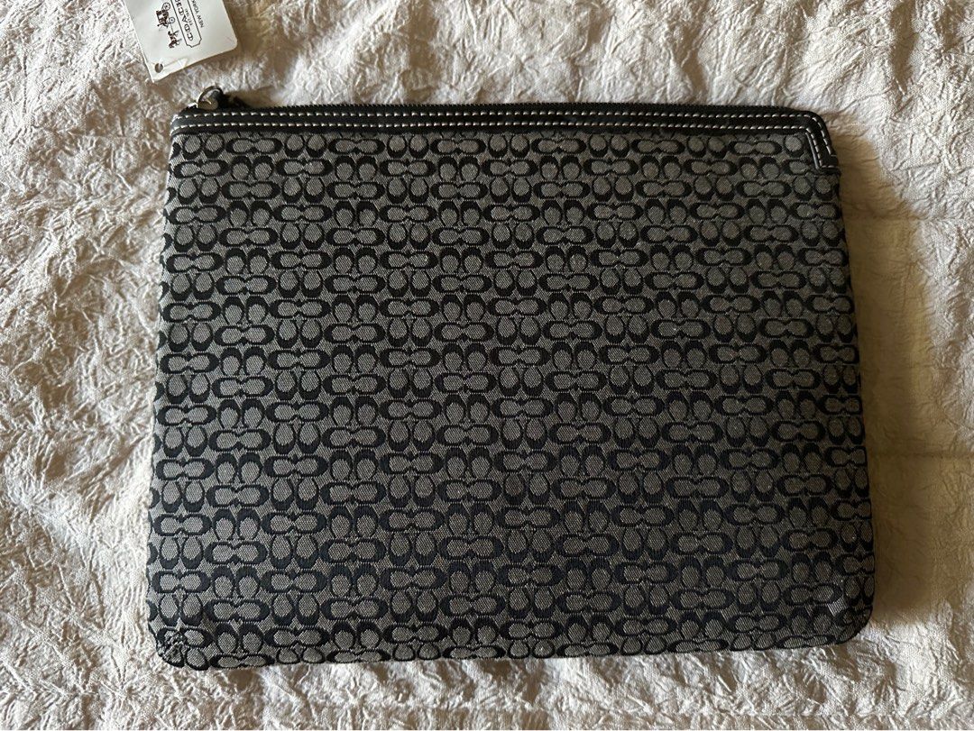 Tablet sleeve (Category: Cases & Sleeves) located in Quezon City. Submitted by patriciach (Listing ID 1290462565, Image 1). Description: COACH TABLET SLEEVE.