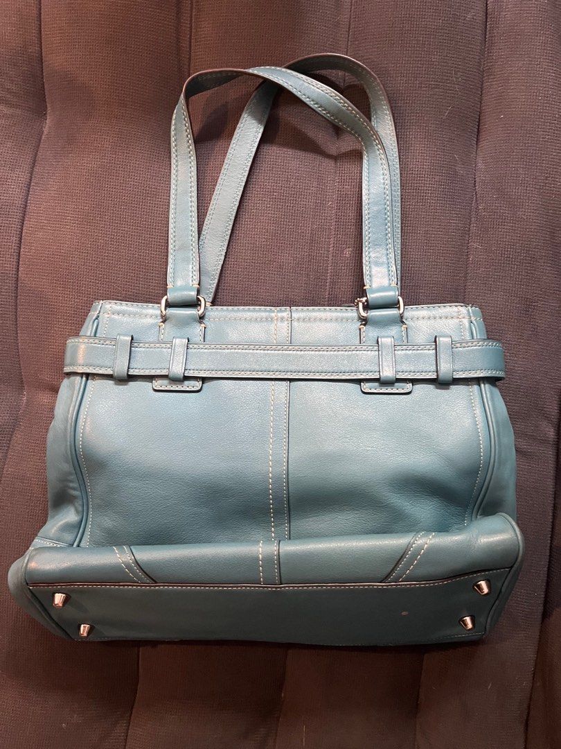Turquoise Blue Coach Handbag (Category: Shoulder Bags) located in Paranaque City. Submitted by martsor (Listing ID 1290507744, Image 2). Description: Genuine Coach bag Style that they no longer produce, fits a lot, no noticeable flaws. RFS: Not being used MOP: BPI, GCash, or Maya .