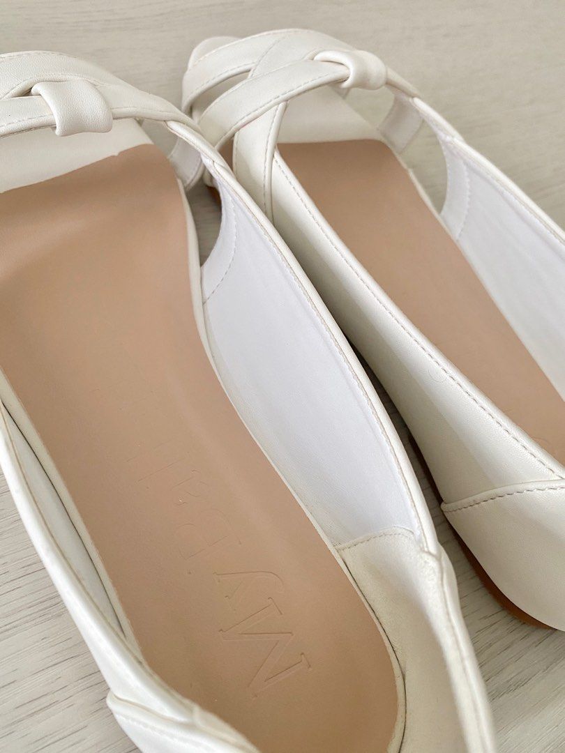 Comfy white shop flats