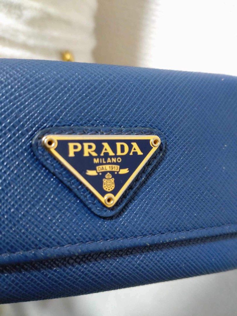 Blue Prada Keycles (Category: Luxury Bags & Wallets) located in Manaoag. Submitted by intheseoulph.shark (Listing ID 1292252962, Image 2). Description: Authentic Prada Keycles.