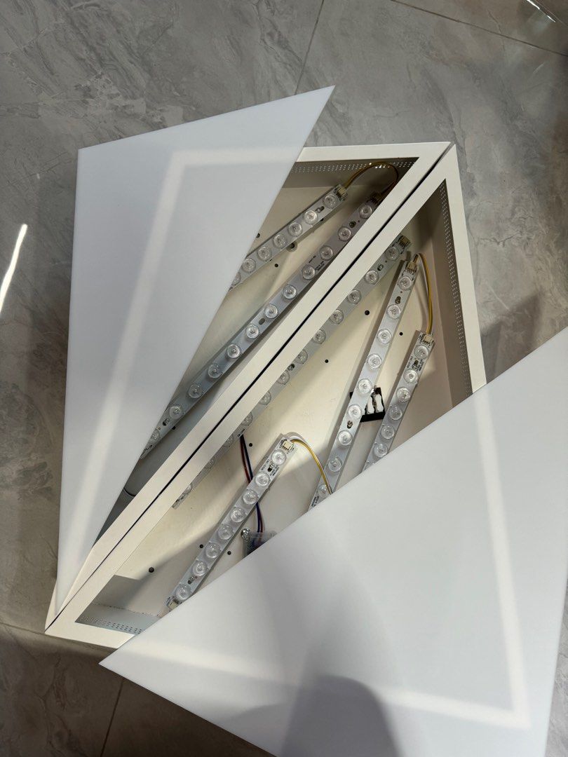 Ceiling light (Category: Lighting) located in Singapore. Submitted by remus.connection (Listing ID 1292159845, Image 2). Description: High watt (specially added) unique design ceiling light. Does not fit the design of my room hence the sale. Very very new condition.