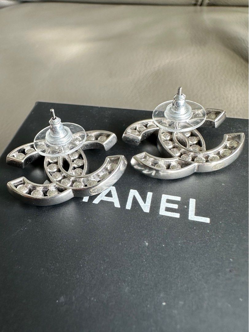 Cc earrings cheap top