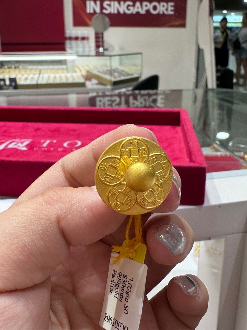 Gold pacifier for babies on sale
