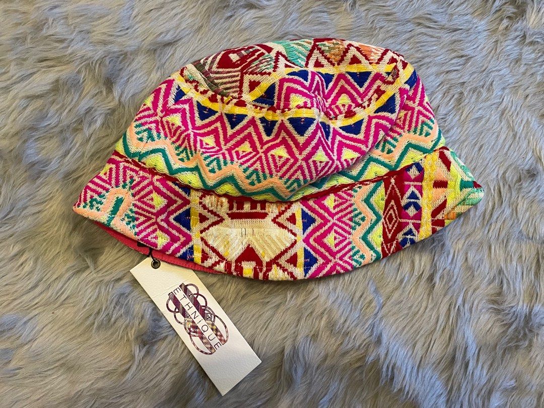Colored Embroidered Bucket Hat (Category: Hats & Beanies) located in Taguig. Submitted by mdjpl (Listing ID 1292162429, Image 1). Description: Bought in IG shop.ethnique for PHP950.00 and selling it lower. Brand new with tag. RFS: Decluttering **if interested , pay for shipping.