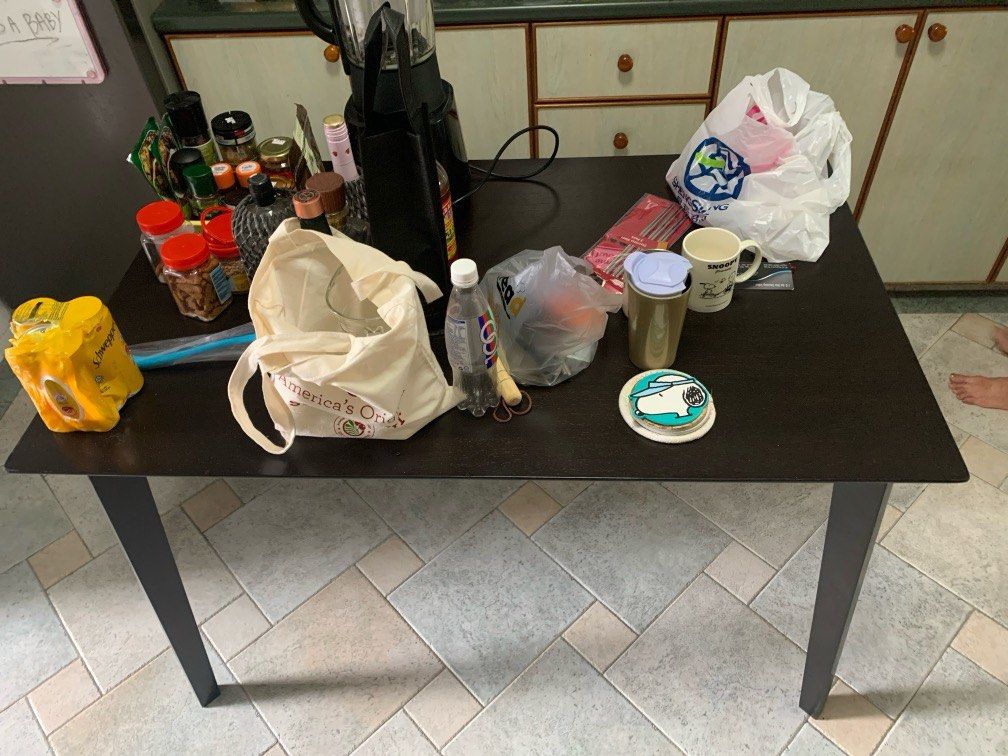 Dining table (Category: Tables & Sets) located in Singapore. Submitted by hhakunamatataa (Listing ID 1292118215, Image 3). Description: Length - 120cm Width - 75cm Height - 75 cm There is a slight dent on the table but still in very good condition. For people who want to change their table or new couples wanting a dining table. Pls do arrange delivery on your own as it is a big table .