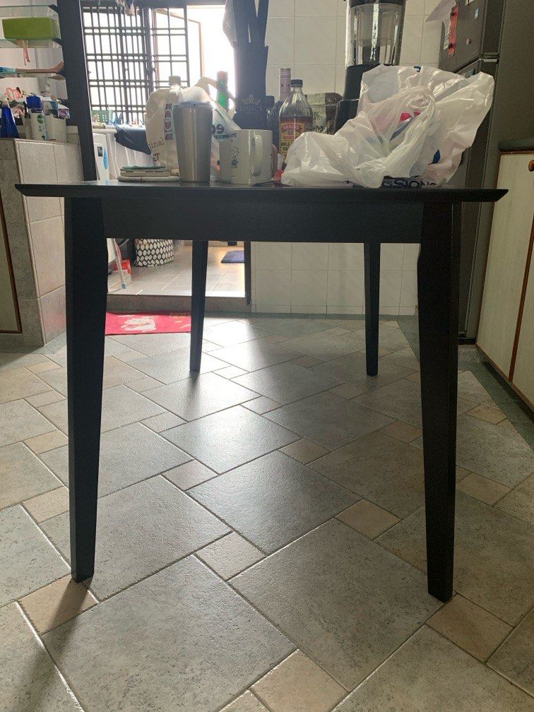 Dining table (Category: Tables & Sets) located in Singapore. Submitted by hhakunamatataa (Listing ID 1292118215, Image 2). Description: Length - 120cm Width - 75cm Height - 75 cm There is a slight dent on the table but still in very good condition. For people who want to change their table or new couples wanting a dining table. Pls do arrange delivery on your own as it is a big table .