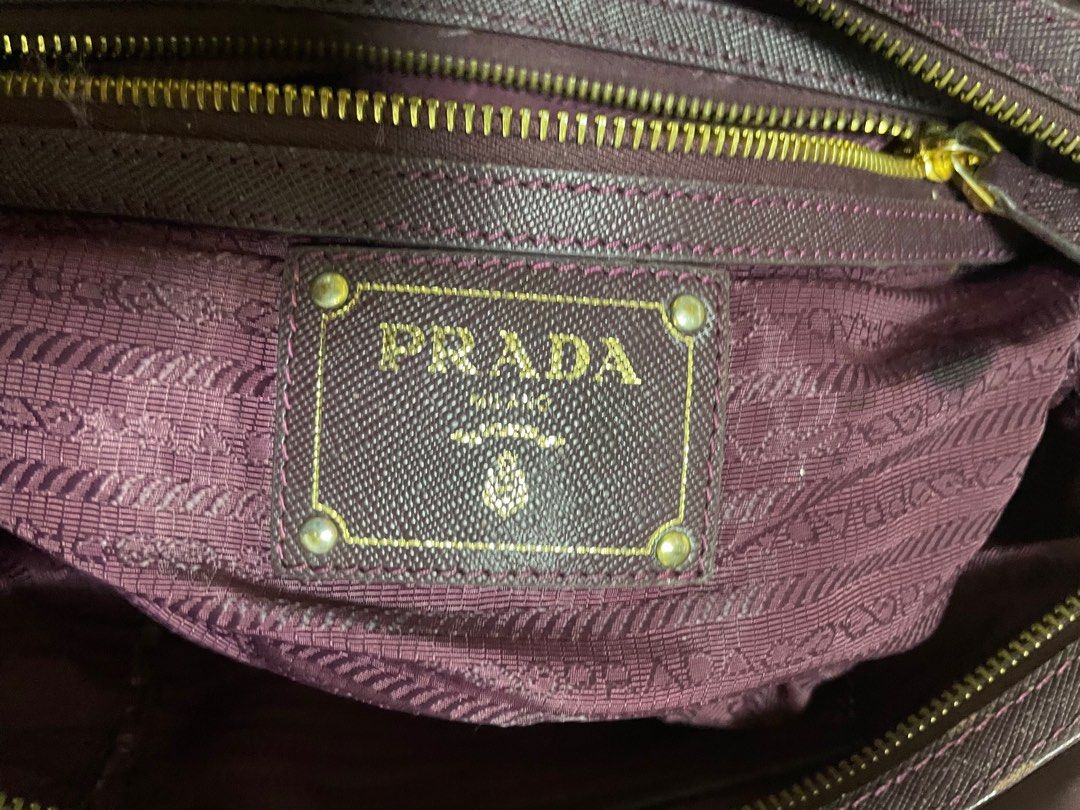 PRADA Bag Nylon Tessuto Maroon Red (Category: Luxury Bags & Wallets) located in Manila. Submitted by eriepash (Listing ID 1292258725, Image 2). Description: 100% authentic Maroonish red (dark) Zippers are all fine No dust bag No box Signs of wear and tear Can still be fixed at Doctor Leather Slightly negotiable Actual photos (what you see is what you get) .