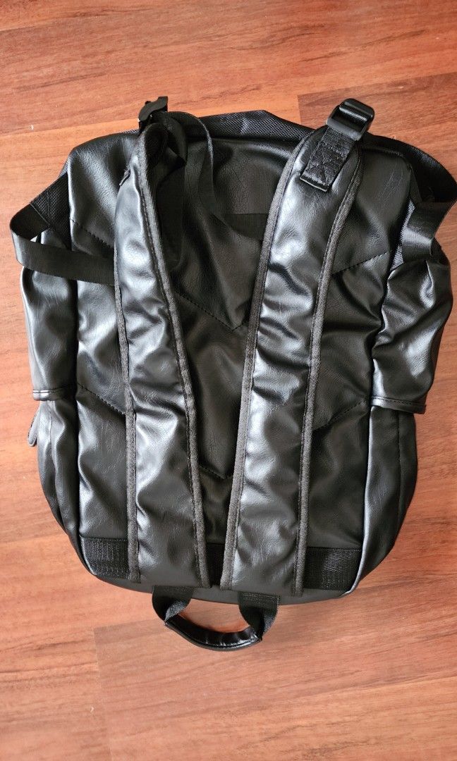 PVC bag pack (Category: Backpacks) located in Singapore. Submitted by donewithcare (Listing ID 1292213402, Image 2). Description: almost new PVC backpack (looks like leather). It has many compartments and an internal laptop sleeve..