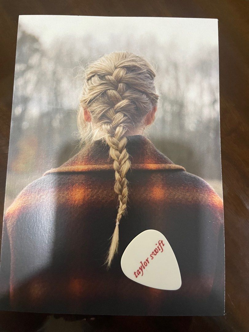 RARE Taylor Swift Evermore Postcard + Guitar Pic Set (Category: CDs & DVDs) located in Manila. Submitted by stefandraboutique (Listing ID 1292120800, Image 1). Description: RARE Evermore postcard + guitar pick set available for 1250 php 🤍.