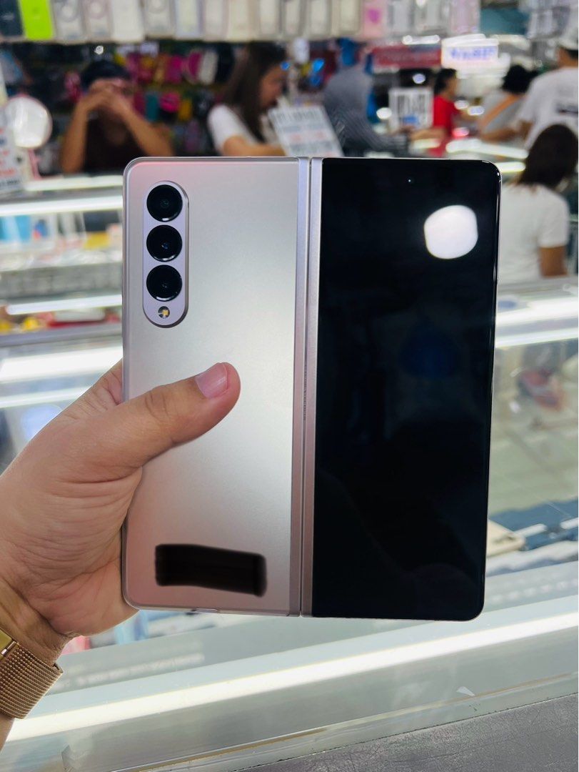 Samsung Fold 3 5G 256gb Single Sim (Category: Samsung) located in San Juan City. Submitted by javedsgadgetshop (Listing ID 1292078737, Image 1). Description: OPEN FOR INSTALLMENT VIA CREDIT CARD/GGIVES & SWAP/TRADE-IN! WE BUY AND SELL ( ANYKINDS OF UNIT BINIBILI PO NAMIN)! PTPA : Padelete po f bawal Read ❗️Onhand ‼️ Samsung Zfold 3 5G •256gb •K Variant •Good batt health •Factory Unlock •95% Smoothness •No hidden issue | No Repaired •100% Authenti