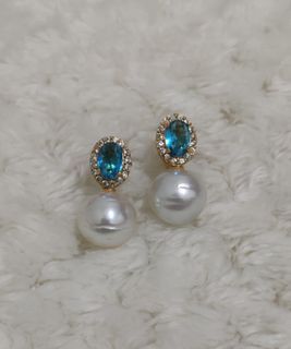 south sea pearl stud with blue topaz zirconia