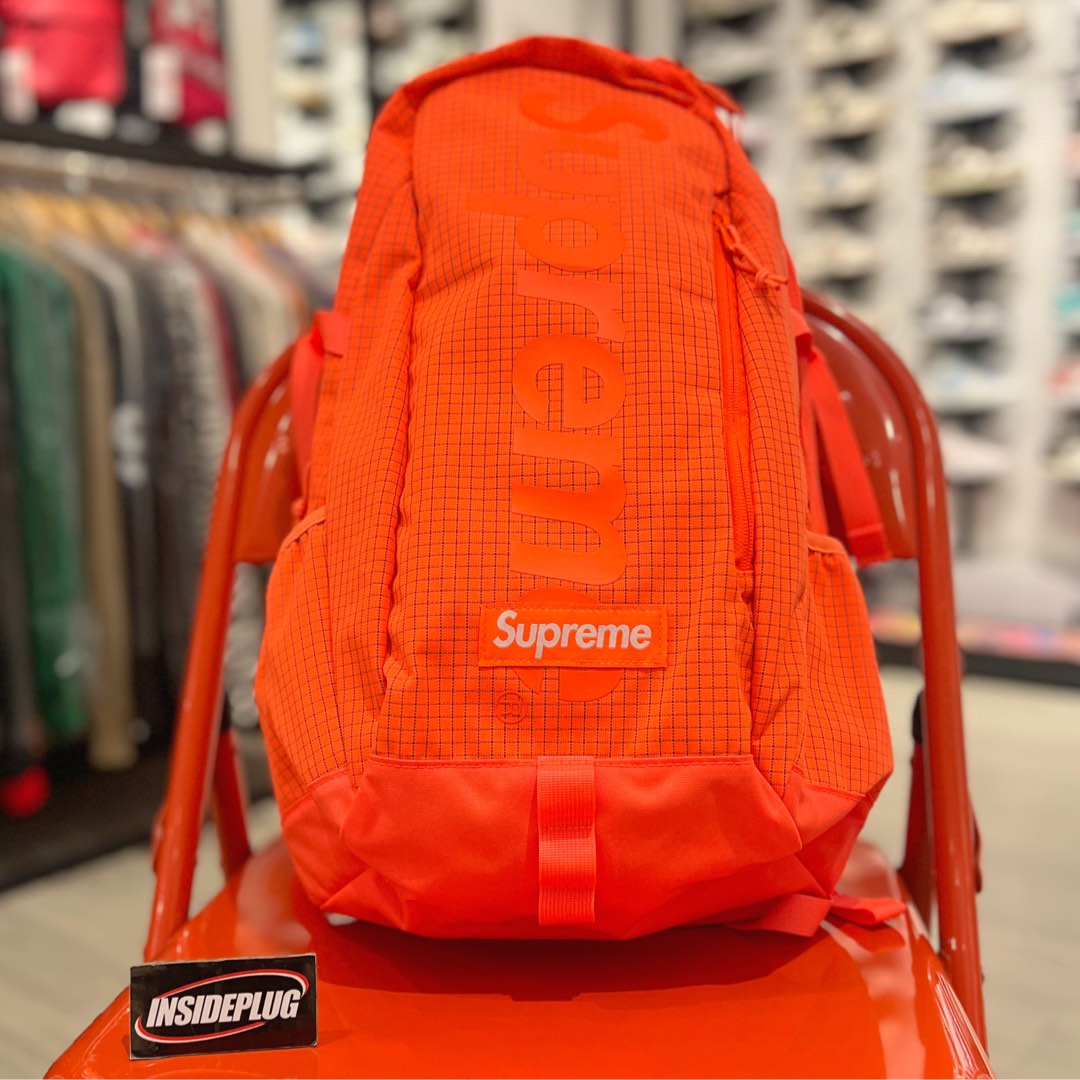 Orange supreme backpack top