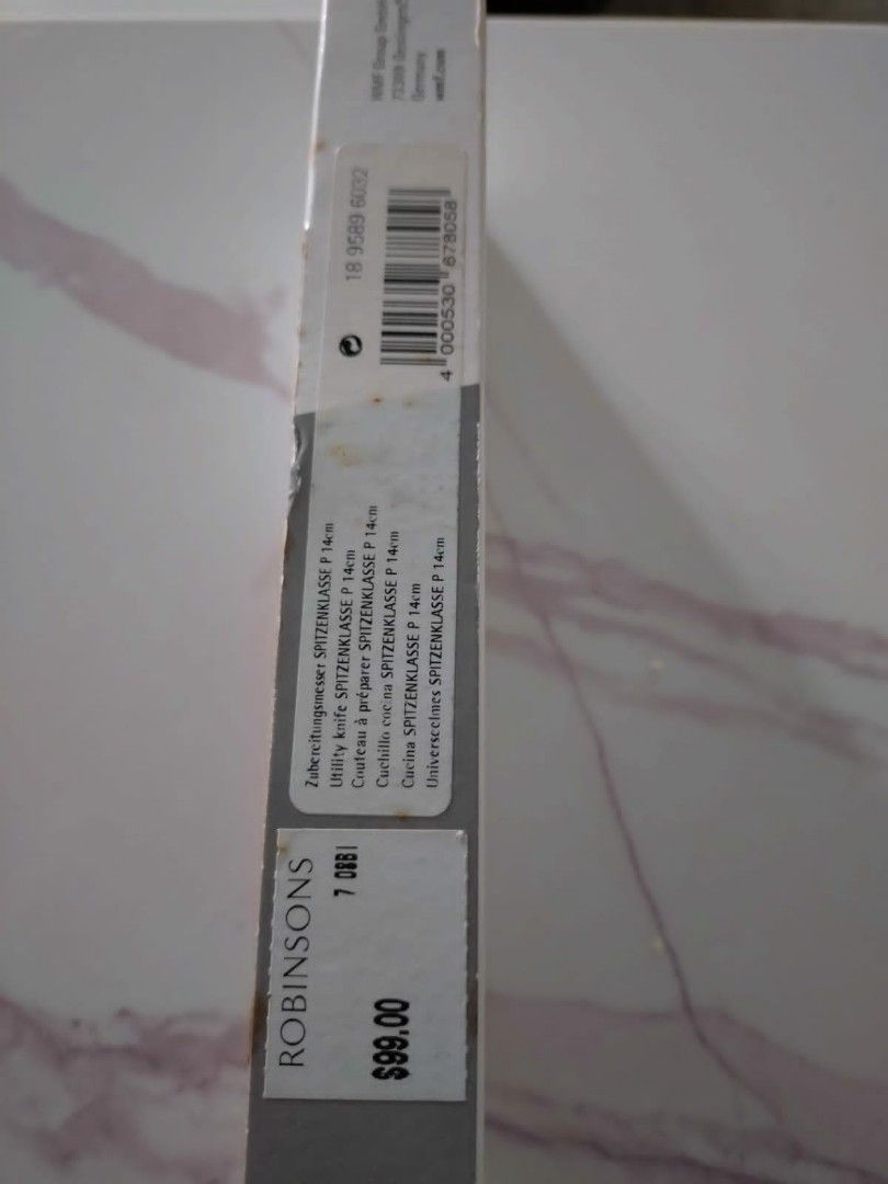 Wmf Utility Knife (Category: Knives & Chopping Boards) located in Calamba. Submitted by len_lozano (Listing ID 1292149023, Image 3). Description: Bought overseas. Brand new knife. Box never opened. Lost in storage for a while thus the color in the box. RFS: Decluttering.