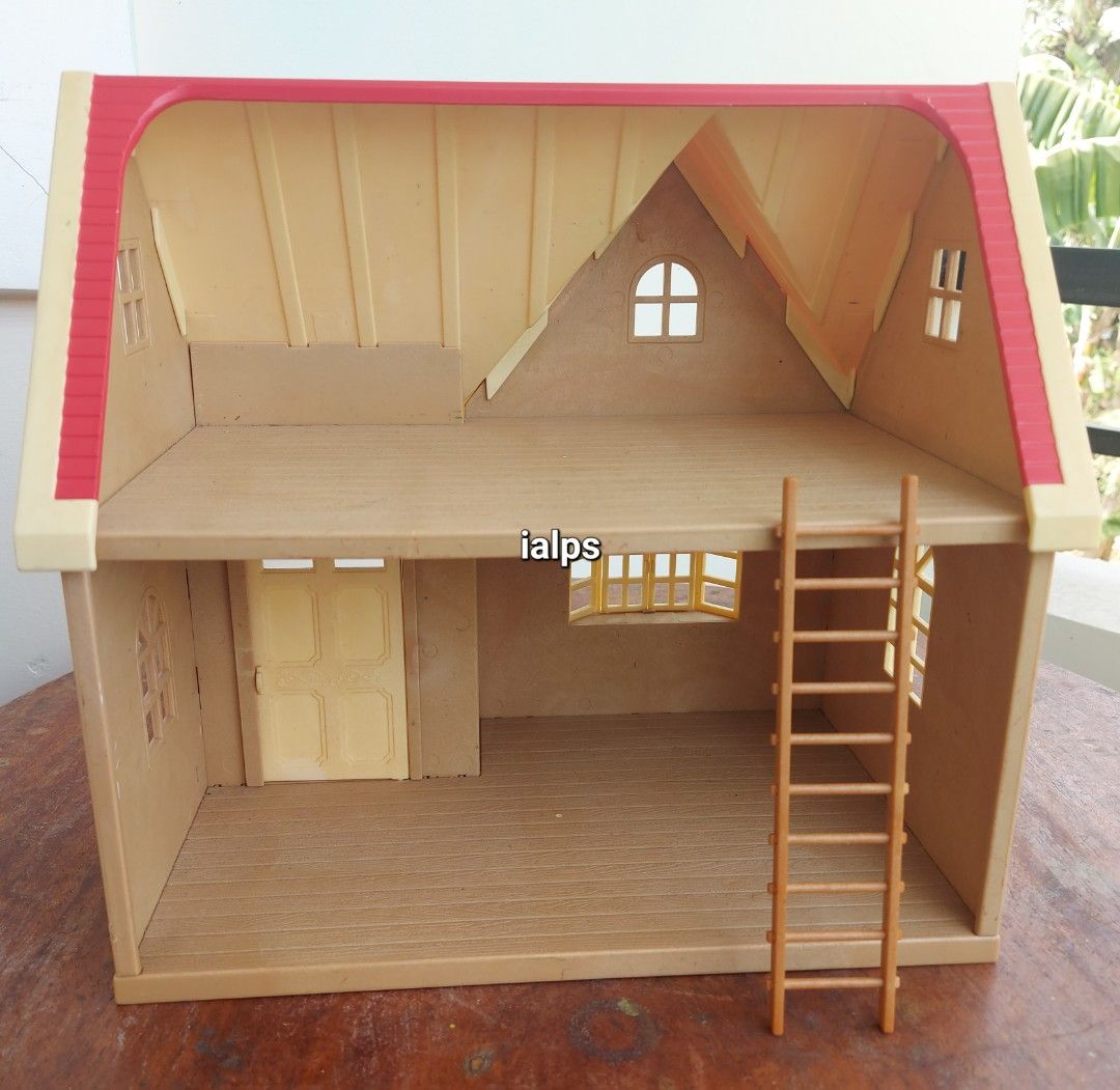 1999 Sylvanian Families Red Orchard Cottage (Category: Kids Toys) located in Angono. Submitted by lpsflover (Listing ID 1292313458, Image 2). Description: *POSTED PRICE IS FOR THE ORCHARD COTTAGE ONLY** With ladder. What you see is what you will get. No original box. Can be paired with the dark brown Primrose Lodge that I am also selling (see last photo). In good condition but manage your expectations on used items. Payment via BPI/BDO. Shipping 