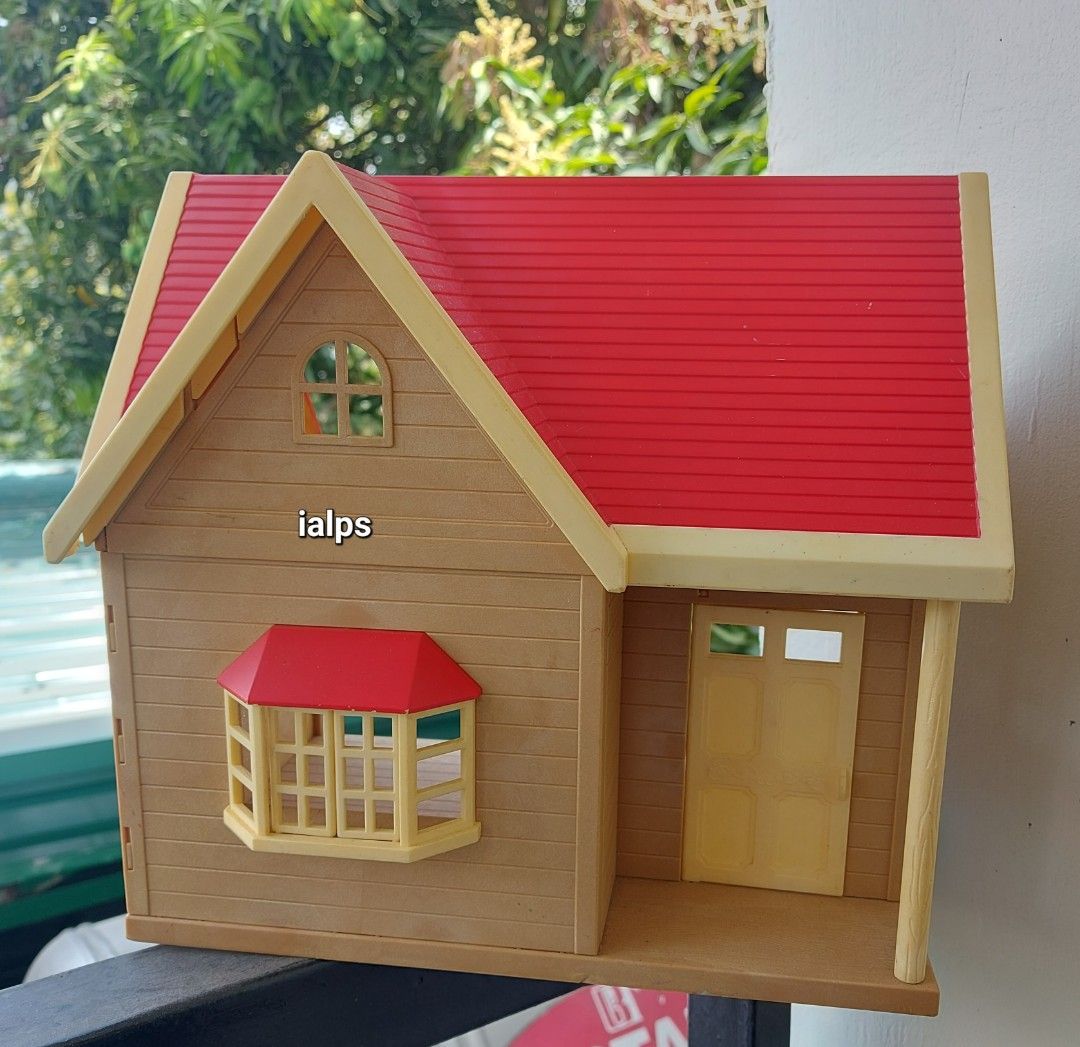 1999 Sylvanian Families Red Orchard Cottage (Category: Kids Toys) located in Angono. Submitted by lpsflover (Listing ID 1292313458, Image 1). Description: *POSTED PRICE IS FOR THE ORCHARD COTTAGE ONLY** With ladder. What you see is what you will get. No original box. Can be paired with the dark brown Primrose Lodge that I am also selling (see last photo). In good condition but manage your expectations on used items. Payment via BPI/BDO. Shipping 