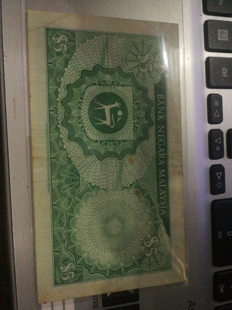 4th 5 ringgit (Category: Currency) located in Singapore. Submitted by currencymind (Listing ID 1292432782, Image 2). Description: Vf to gvf.