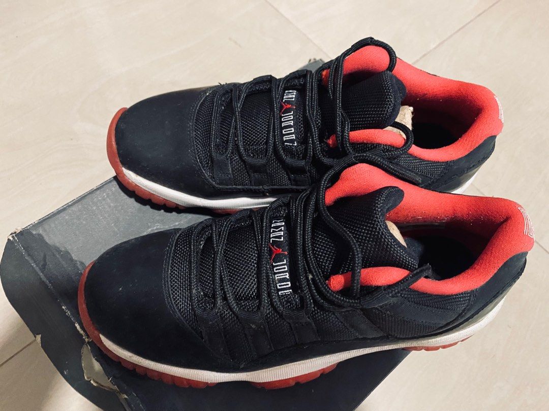 Air Jordan 11 Retro Low BG (Category: Sneakers) located in Quezon City. Submitted by flatfootedmd (Listing ID 1292444854, Image 2). Description: Air Jordan 11 Retro Low Black/Red Size Eu 37.5 UK 4.5 Used less than 5 times Reason for selling - small size; decluttering space.