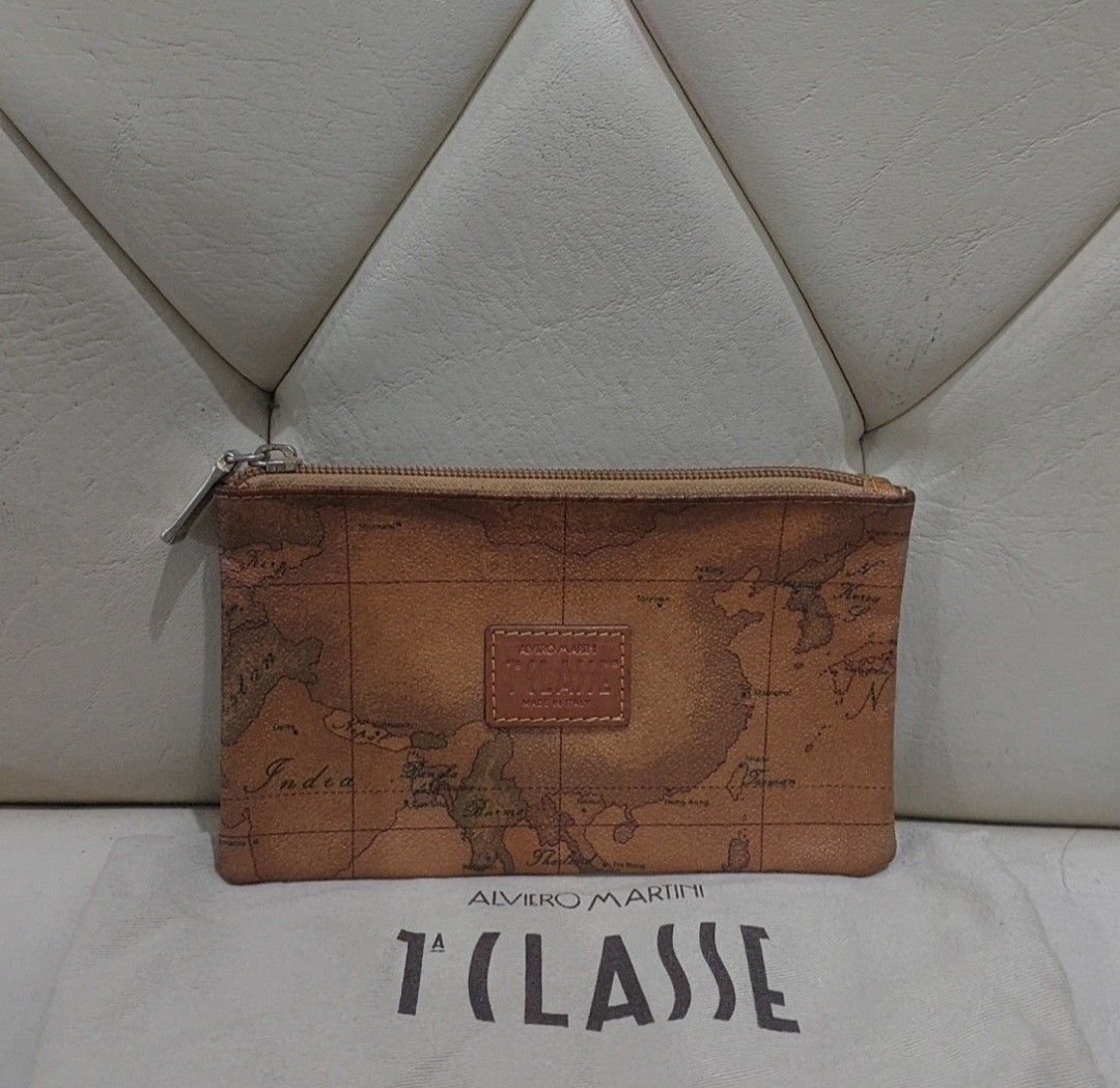 Authentic Alviero Martini long wallet (Category: Luxury Bags & Wallets) located in Binangonan. Submitted by makoleksyon (Listing ID 1292394147, Image 1). Description: excellent condition no flaws bought in Japan with dust bag included 💯% Authentic Money back guarantee.