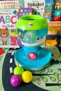 Fisher price go baby go swirl n tunes gumball top